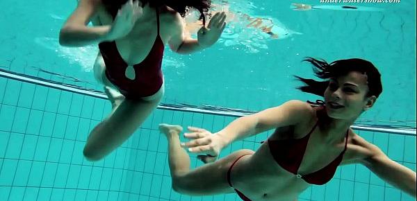  Two sexy lesbians in the pool